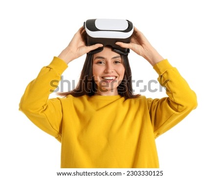 Happy young woman with VR glasses isolated on white background