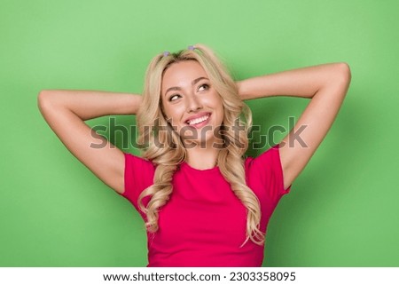 Photo portrait of relaxed pretty young gorgeous lady hands head take nap thoughtful look empty space imagination isolated on green color background