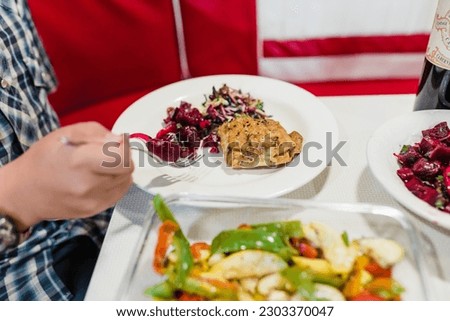 Eating a Colorful Meal inside an RV with Red, White, and Blue Colors