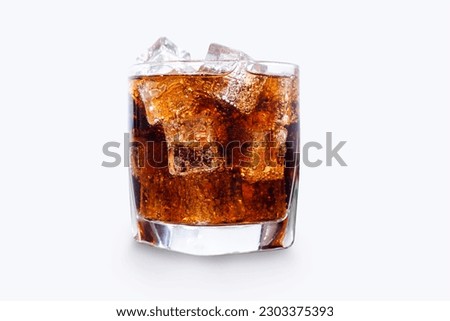 Glass of refreshing cola with ice on white table Royalty-Free Stock Photo #2303375393