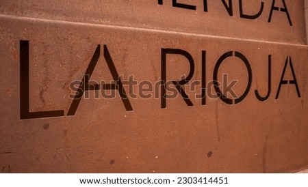 Rusty iron sign with the word La Rioja