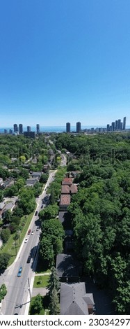 Experience breathtaking panoramic views of modern cityscapes, luxurious pools, and charming cottages in Toronto. These stunning drone pictures capture the essence of urban and natural beauty.