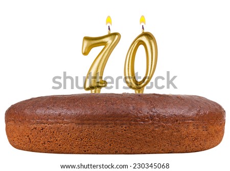 birthday cake with candles number 70 isolated on white background