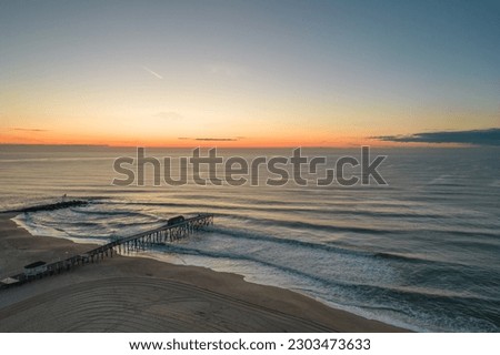 Crack of dawn at the Jersey Shore Royalty-Free Stock Photo #2303473633