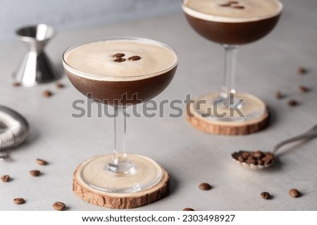 Espresso Martini Cocktail booze vodka, coffee liqueur, espresso and coffee beans Royalty-Free Stock Photo #2303498927