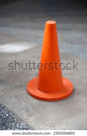 Orange signaling cone. I know road safety. Industrial Security. Sign. Icon. Protection. Watch out. Signaling.	