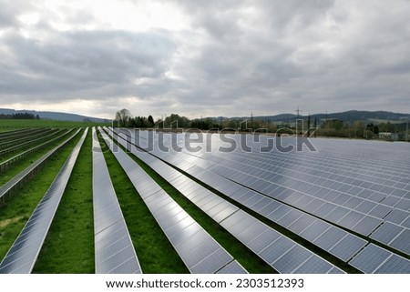 Modern solar power plant, photovoltaic panels green energy electricity production,new power plant,European energy crisis 2022, green deal,Czech republic,European Union,aerial panorama landscape view