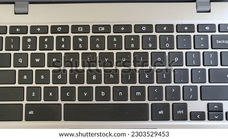 Laptop keyboard with black notes