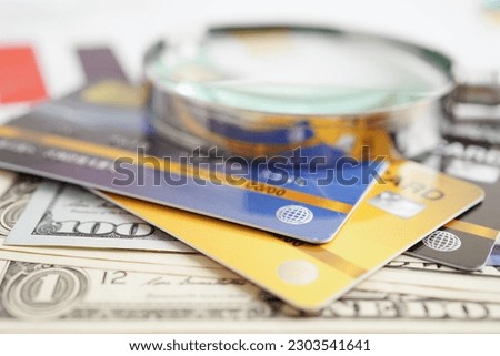 Credit card with password key lock and US dollar banknote money, security finance business concept.