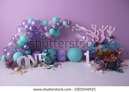 personalized balloon decoration for smash the cake studio photo shoots.
Great for family rehearsals and also for smash the cake. Royalty-Free Stock Photo #2303546921