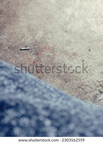 the rest of the white cigarettes are thrown to the ground unsanitary Royalty-Free Stock Photo #2303562559