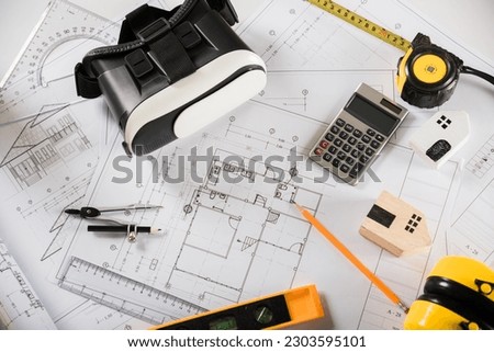 Architect workplace top view. Architectural blueprint paper project plans on desk table, tool for engineer contractor building design working drawing and VR glasses, industry virtual technology
