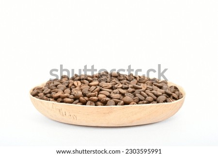 Roasted organic Cocoa Beans on white Background Stock Photo, Picture.front view. 