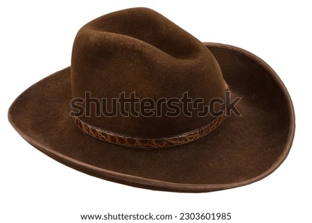 Vintage old west brown cowboy hat isolated on white Royalty-Free Stock Photo #2303601985
