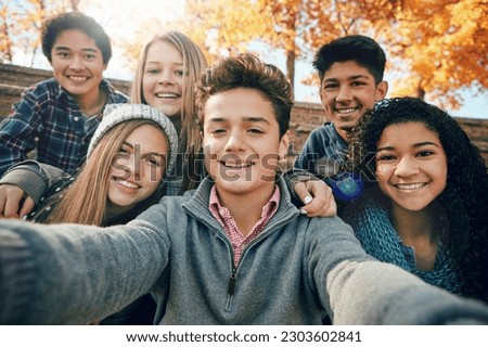 Friends, teenager and group selfie in the park, nature or fall trees and teens smile, picture of friendship and happiness for social media. Portrait, face and happy people together for autumn photo
