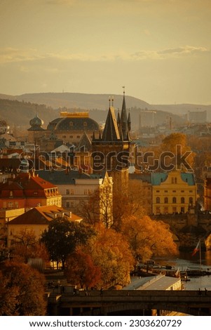 landscape with Old Town Bridge Tower in the evening in autumn in Prague, Czech Republic.