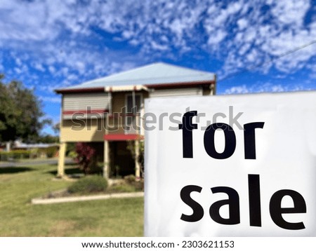 For sale middle class property outdoor street sign. Real estate and housing market cost of living concept. No people. Copy space.