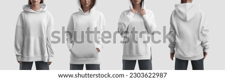Mockup of a long white hoodie with slits, pocket, on the girl, front, back, clothes for design, brand. Product photography set for commerce. Apparel template, female shirt isolated on background. Royalty-Free Stock Photo #2303622987