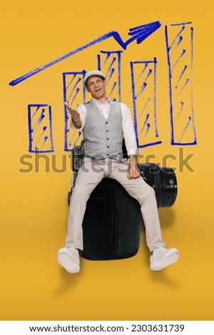 Happy successful photographer generating new ideas for business growth, on a yellow background
