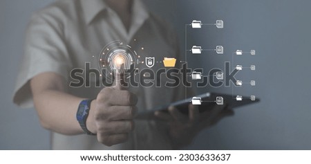 Businessman scans finger to access document information online through protection Document Management System (DMS) Online Document Database and a digital file storage system