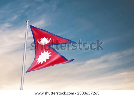 Waving flag of Nepal in beautiful sky. Nepal flag for independence day. The symbol of the state on wavy fabric. Royalty-Free Stock Photo #2303657263