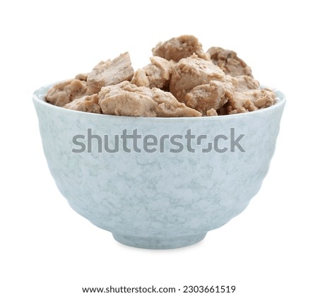 Bowl of tasty cod liver on white background