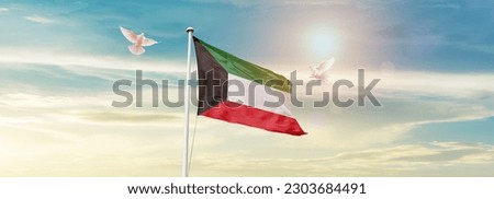 Waving flag of Kuwait in beautiful sky. Kuwait flag for independence day. Royalty-Free Stock Photo #2303684491