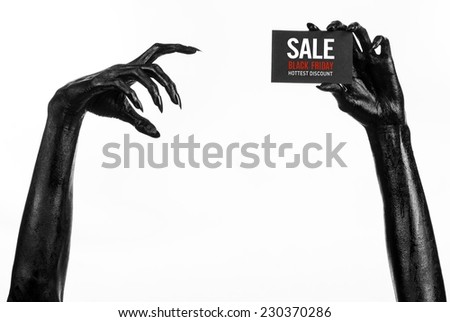 Black Friday theme: black hand holding a card with discount on white background