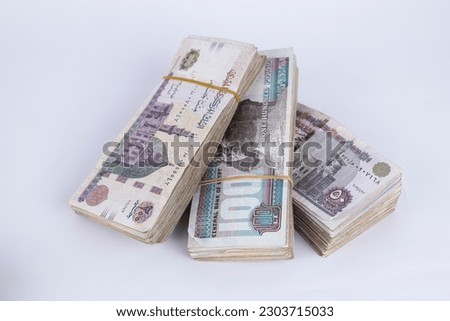 egyptian Cash isolated on white background Royalty-Free Stock Photo #2303715033