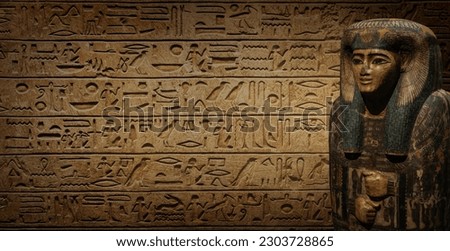 Sarcophagus with an Egyptian mummy on old Egyptian hieroglyphs. Ancient Egyptian hieroglyphs as a symbol of the history of the Earth. Ancient historical background.  Royalty-Free Stock Photo #2303728865