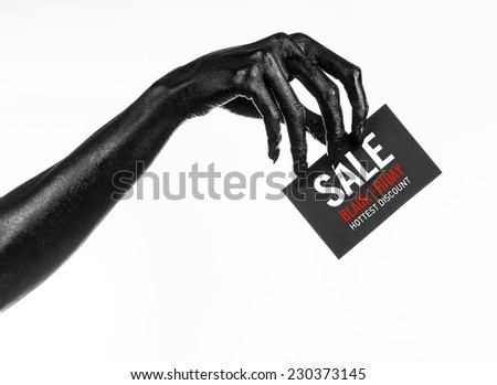 Black Friday theme: black hand holding a card with discount on white background