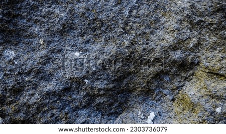 Background texture of stone in closeup picture, with unique color, texture, and pattern, graphics design.
