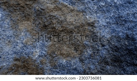 Background texture of stone in closeup picture, with unique color, texture, and pattern, graphics design.
