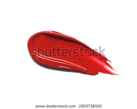 Red lipstick glossy texture, texture stroke isolated on white background. Cosmetic product swatch Royalty-Free Stock Photo #2303738103