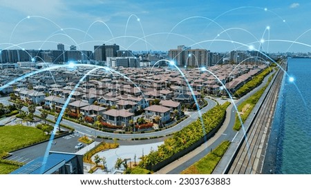 Modern residential area and communication network concept. Internet of Things. Smart house. Royalty-Free Stock Photo #2303763883