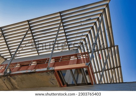 
The roof structures of the Capbreton harbor master's office Royalty-Free Stock Photo #2303765403