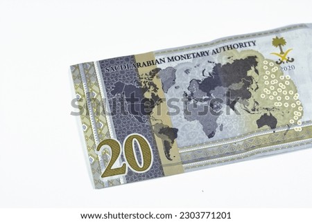 Reverse side of 20 SAR twenty Saudi Arabia Riyals banknote currency bill money Commemorative issue with a map of the world depicting G20 summit countries in a different color series 2020 AD 1442 AH Royalty-Free Stock Photo #2303771201