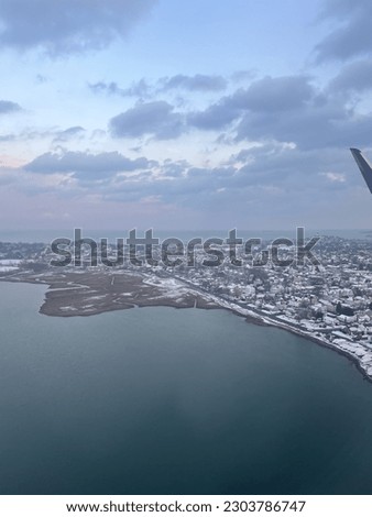 Beautiful pictures of sky and land, taken from a plane. Amazing cityscapes and clouds