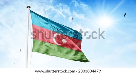 Azerbaijana flag waving on a high quality blue cloudy sky Royalty-Free Stock Photo #2303804479