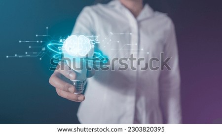 AI technology computing process, hand holding a white light bulb showing the brain of a robot, AI computing, high-precision processing, data analysis technology