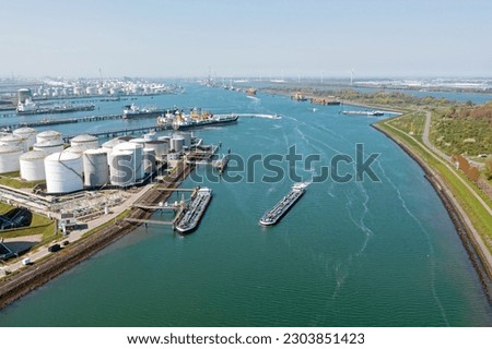 Aerial from industry in the Rotterdam harbor in the Netherlands Royalty-Free Stock Photo #2303851423
