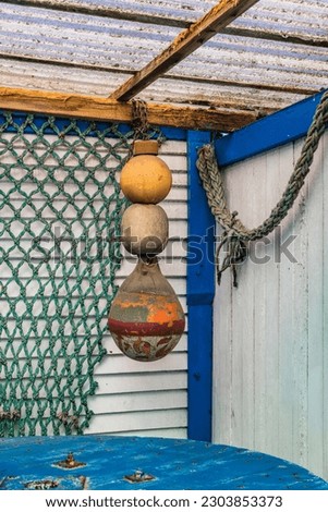 Fishing net floats hanging as a decoration