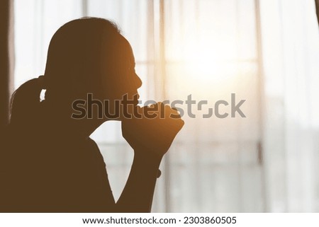 Christian life crisis prayer to god. Woman Pray for god blessing to wishing have a better life. woman hands praying to god with the bible. begging for forgiveness and believe in goodness. Royalty-Free Stock Photo #2303860505