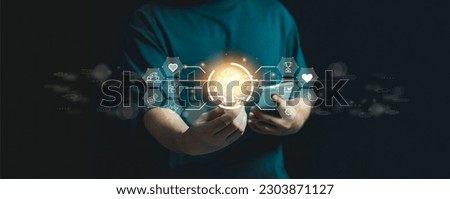 Business man hold brain human.Soft skills concept.soft skill for personal responsibility HR human resources to Communication Management creativity,EQ,Problem solving,collaboration,adaptability.  Royalty-Free Stock Photo #2303871127