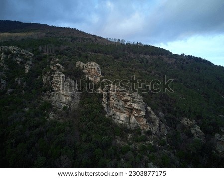 aerial view of rock crag. drone photo of the crag. Crag in the Buti wood, Pisa. Natural landscape seen from above. rock climbing. Buti's crag