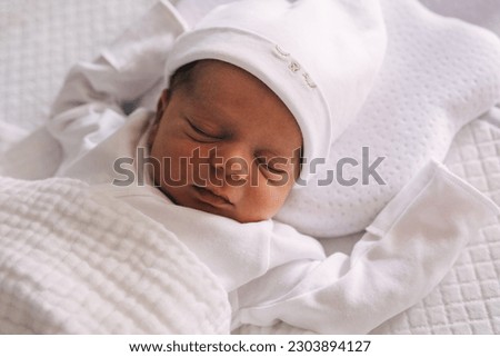 Beautiful caucasian newborn baby Child sleeping in bed. Little kids concept. Close-up portrait Royalty-Free Stock Photo #2303894127