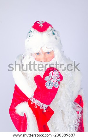 Isolated Picture of Santa Claus with gifts bag with beard in traditional red costume, christmas