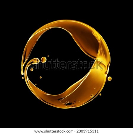 Glowing oily splashes arranged in a circle on a black background