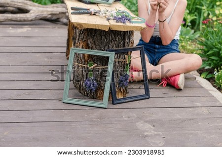lavander flowers bouquet in wooden frame, creative ideas
