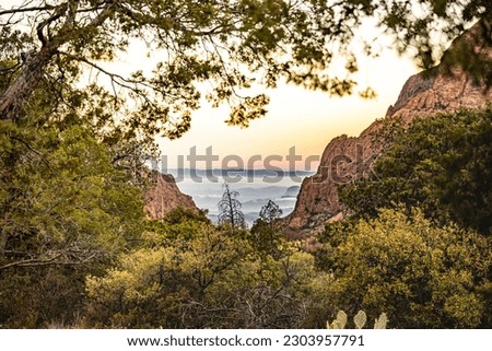 Clouds Hang In The Valley Through the Window In Big Bend National Park Royalty-Free Stock Photo #2303957791